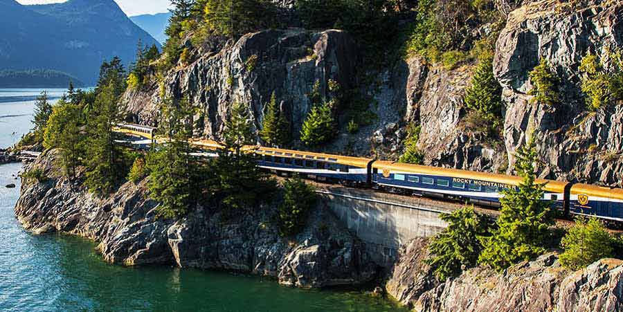Train traveling through the Canadian Rockies